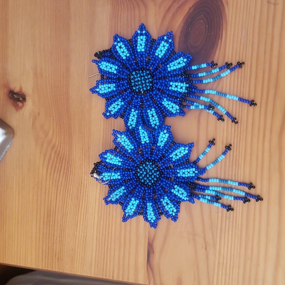 Large hand beaded earrings